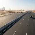 Precast concrete barriers lining a UAE highway project