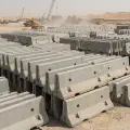 Precast concrete Jersey barrier stockpile at the Dubai factory