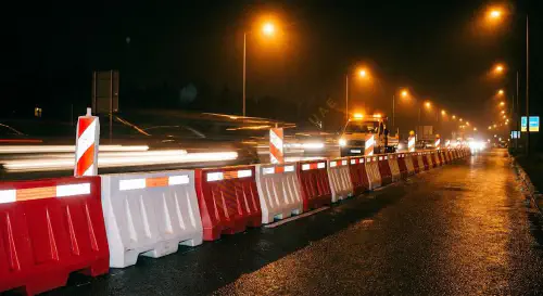 Red and white plastic barriers for traffic separation